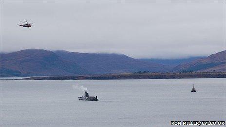 A Royal Navy helicopter flying over HMS Astute. Pic: Ron Miller