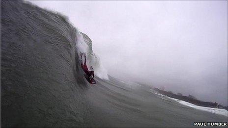 surfer riding the wave