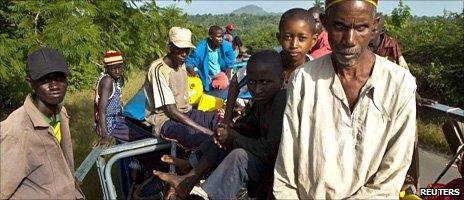 Ethnic Peul and supporters of Cellou Dalein Diallo leave Dabola town in northern Guinea on a commercial truck, 31 October 2010