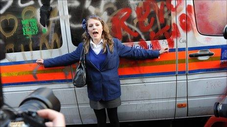 A south London pupil protecting a police van