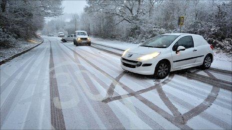 Cars turn around as they struggle to climb the hill on Penrhiwfer Road, Tonyrefail