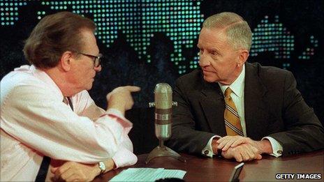 File photograph of Larry King with Ross Perot