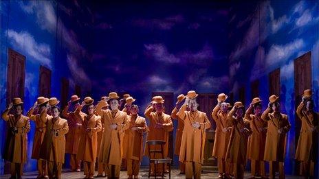 The chorus in the Welsh National Opera's production of The Magic Flute