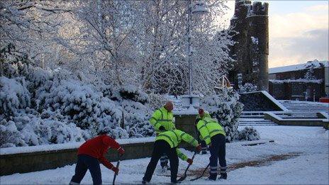 Workmen clearing Castle Square in Swansea