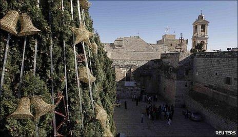 Christmas tree outside nativity church