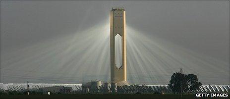 The PS10 solar tower plant near Seville, Spain. Mirrors concentrate the sun's power on to a central tower, driving a steam turbine