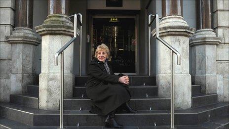 Pat Fitzgerald on the steps of the Royal Hotel, where she was found in 1939