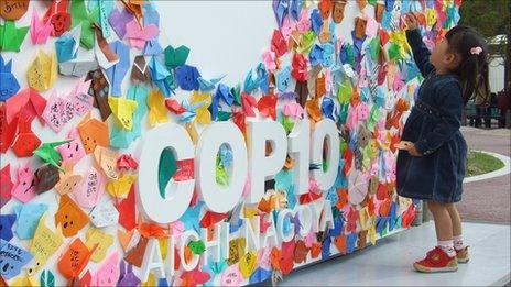 Girl and logo at UN biodiversity meeting