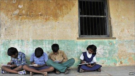 Indian school children outside a classroom at a government primary school in Hyderabad