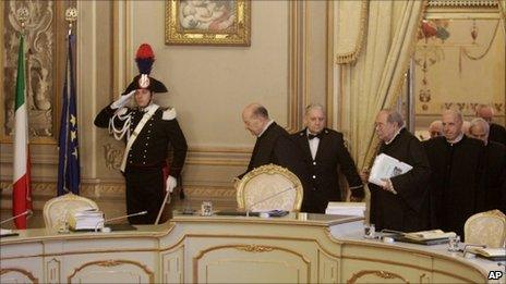 Italian Constitutional Court Judges arrive in a courtroom in Rome, 11 January