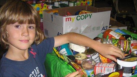 Child with food parcel