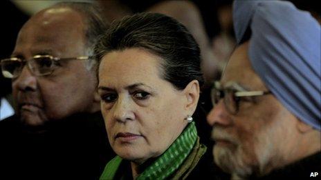 Indian Prime Minister Manmohan Singh, right, Congress party president Sonia Gandhi, centre and Indian Agriculture Minister Sharad Pawar, left, at the swearing-in ceremony of newly appointed ministers in Delhi, India, 19 January 2011