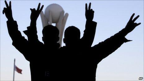 Bahraini protesters celebrates at the Pearl roundabout in Manama, Bahrain, 19 February 2011