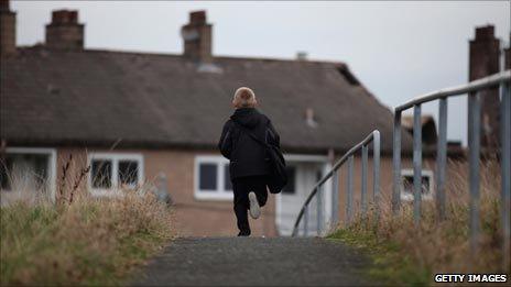 A boy on a housing estate