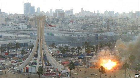 Smoke and flames at Pearl Square in Manama, 16 March (14 February Media Committee)