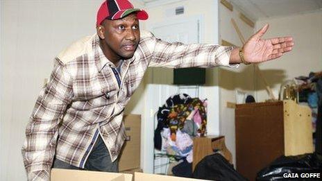 A Kenyan immigrant in the US packs to return to Africa. Photo by Gaia Goffe