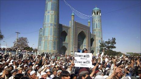 Afghans chant anti US slogans during a demonstration in Mazar-e- Sharif on Friday, April. 1, 2011