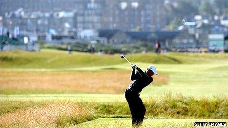 Woods playing on the course at St Andrews