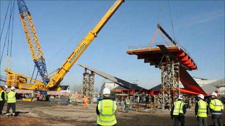 Part of bridge being lowered into place