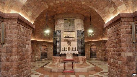The tomb of St Francis of Assisi in the crypt in the lower church of Assisi's Basilica, Italy