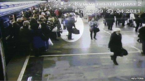 The suspected Minsk metro bomber is picked out with a white circle in a CCTV still released by prosecutors