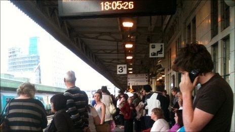 Passengers wait for delayed trains at Cardiff Central