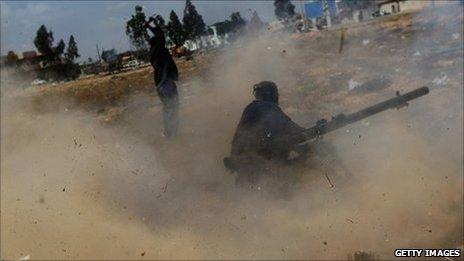 Libyan rebels fire a rocket propelled grenade during street fighting on Tripoli Street in Misrata, 20 April Libya. Picture by Chris Hondros, who was killed later on Thursday.