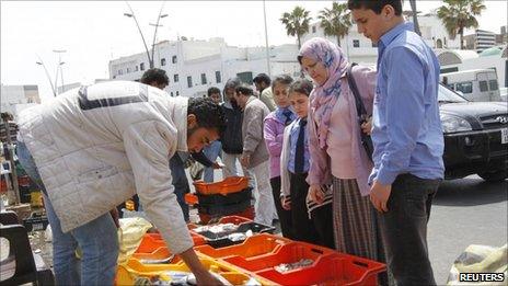 Selling fish to residents in Tripoli on 16/4/11