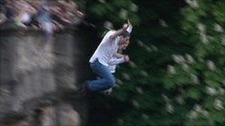 The revellers jumping from Magdalen Bridge in Oxford