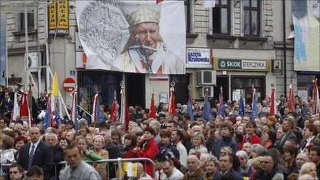 People take part in a Holy Mass in the town of Wadowice, the birth place of the late Pope John Paul II, on 1 May 2011