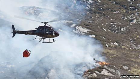 Helicopter water bombing at Sheil Bridge. Pic: Ian Gordon