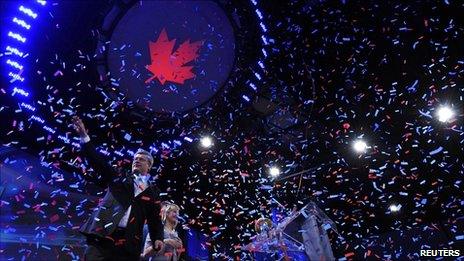 Canadian Conservative Party leader and Prime Minister Stephen Harper waves to supporters following his victory speech at his federal election night headquarters in Calgary, Alberta, on 2 May 2011