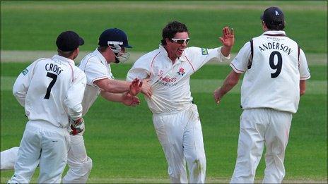 Lancashire spinner Simon kerrigan celebrates a wicket