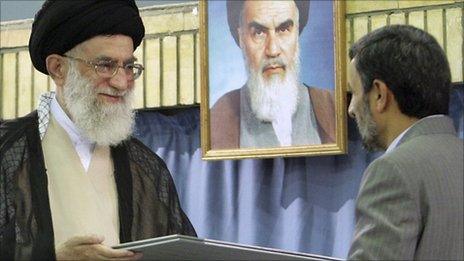 Ayatollah Ali Khamenei presenting the presidential decree to Mahmoud Ahmadinejad in August 2009