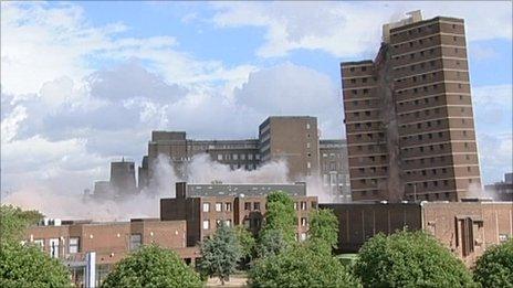 The second tower block going down