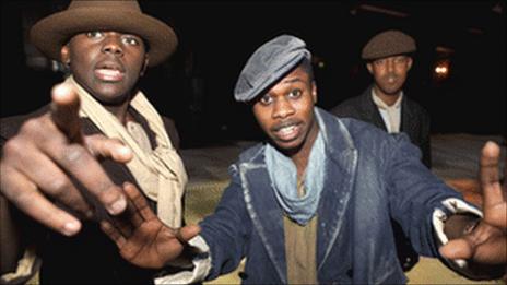 Three young men in costume