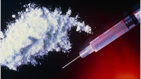 Syringe and heroin powder used by a heroin addict Heroin addiction