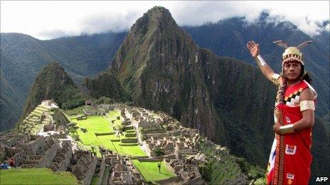 A man dressed in a typical Inca attire participates in a practice session atop of the Inca citadel of Machu Picchu on 19 April, 2011