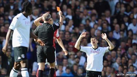 Zoltan Gera (far right) despairs as he is sent off