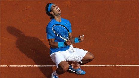 Rafael Nadal celebrates his win over John Isner