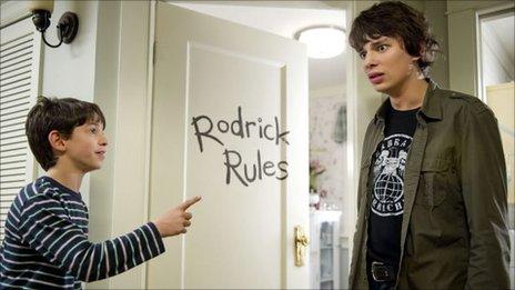 Still from Diary of a Wimpy Kid: Rodrick Rules (Zachary Gordon as Greg and Devon Bostick as Rodrick.)