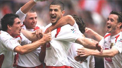 John Mousinho celebrates after scoring