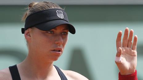 Vera Zvonareva waves her hand during her match against Anastasia Pavlyuchenkova