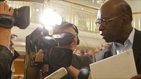 Jack Warner faces the media