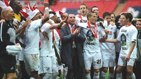 Swansea players celebrate promotion