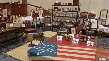 Items from the Palm Beach, Florida home of Bernard Madoff are shown at the Miami Beach Convention Center in Florida, 3 June 2011.