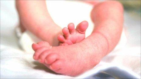 Feet of newborn baby