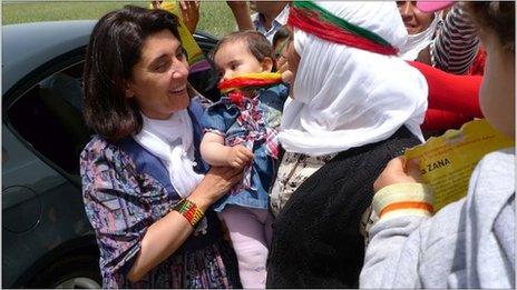 Leyla Zana (head uncovered) meets supporters