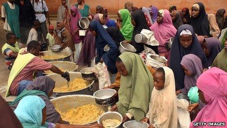 Somalis receive food rations at a distribution centre in 2010.