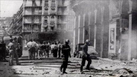 A petrol station smoulders during the independence war in Algeria (archive shot: 1956)